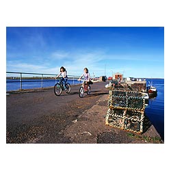 Longhope - Children riding bicycles on South Ness pier outdoor uk kids cycling child  photo 