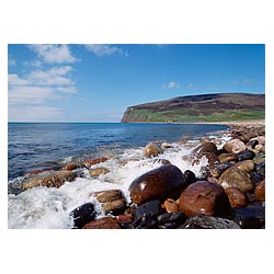 Rackwick Bay - Sea waves splashing onto boulder rocks on beach cliffs shore lapping scotland  photo 