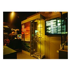 Vistor centre - Story of Skara Brae person operating multimedia computer display cabinet  photo 
