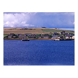  - Fishing boat approaching Burray village harbour pier  photo 