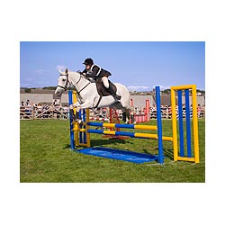 County Show - White pony Horse jumping competition event over fence ground ring girl uk  photo 