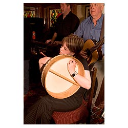 Orkney Folk Festival - Musicians playing Bodhran celtic music pub play irish drum woman  photo 