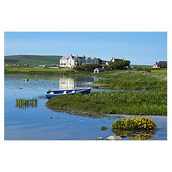 Loch of Harray - Anglers fishing boat on shore and Merkister Hotel lochside scottish  photo 