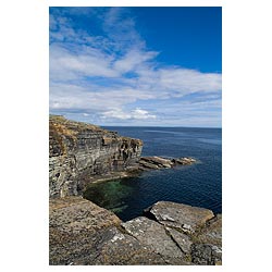 Clu Ber - East coast seacliffs calm blue sea and sky seascape rugged cliff top edge  photo 