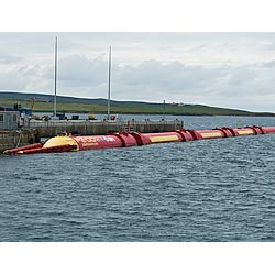 Pelamis Wave Energy Converter - Offshore wave energy generator at Lyness Pier scotland renewables power uk  photo
 
