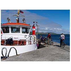 Moaness Pier - Scotland Tourist bike passengers orkney ferries ferry cyclist island uk people  photo 