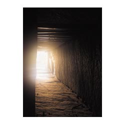  - Neolithic burial mound entrance passage with midwinter sun  photo 
