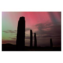  - Aurora Borealis red Northern Lights and neolithic standing stone circle  photo 