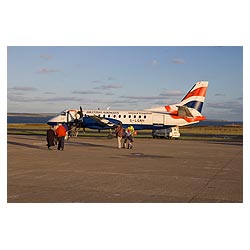  - Passengers boarding BA aeroplane Saab 340 on runway british airways 340b  photo 