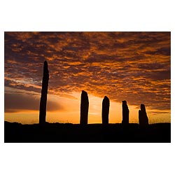  - Britain Neolithic standing stones orange and grey sunset cloudy dusk sky  photo 