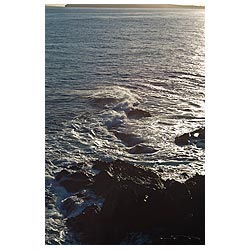 Grim Ness - Seawaves surging over rocks rough sea  photo 