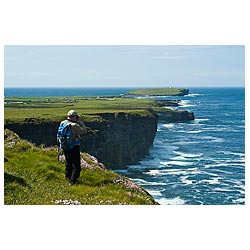  - North coast seacliffs birdwatcher with binoculars watching bird uk watcher  photo 