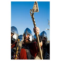 Up Helly Aa procession - Guizer Jarl Einar of Gullberuviks Viking cheering with axe  photo 