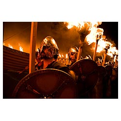 Up Helly Aa fire torch process - Vikings escorting Viking longship parade festival torches jarl squad people  photo
 